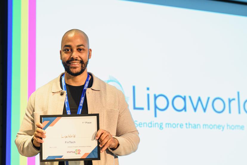 Lipaworld CEO holding up the first place certificate